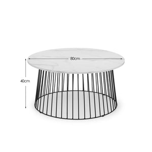 Round coffee table with white top and black metal base, dimensions indicated.
