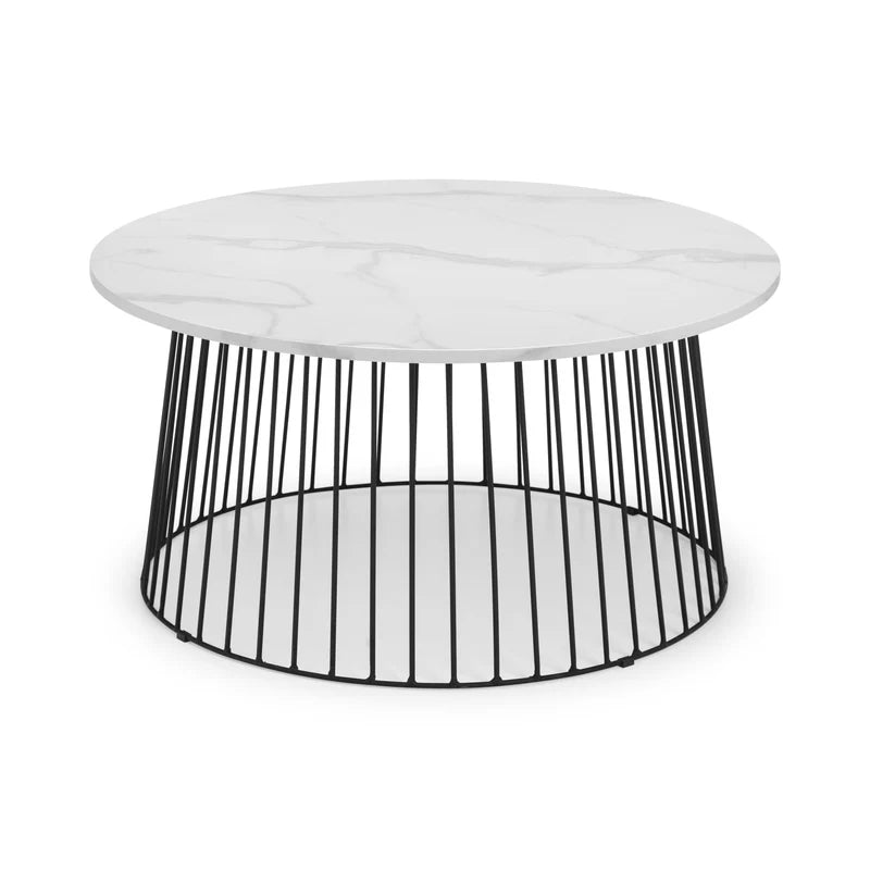 Round coffee table with white marble top and black metal base on a white background