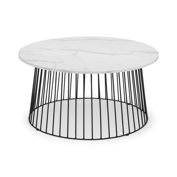 Round coffee table with white marble top and black metal base on a white background