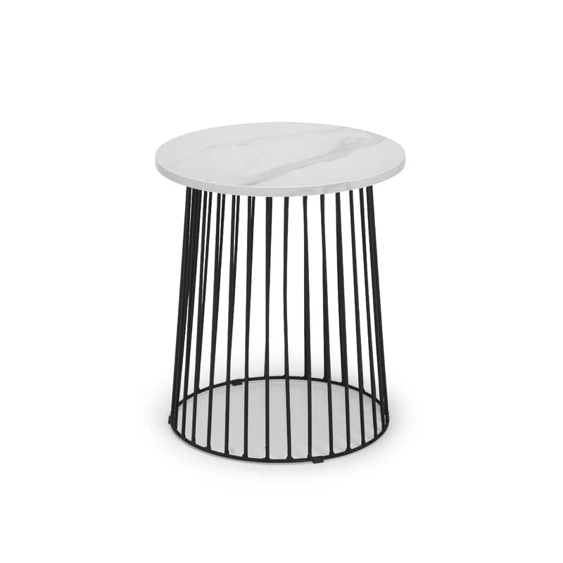 Side table with white marble top and black metal base on a white background