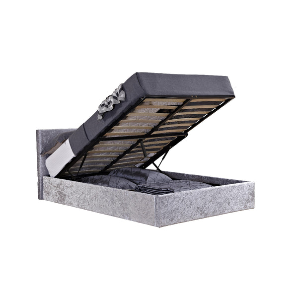 Open gray jewelry box with a bow on a white background