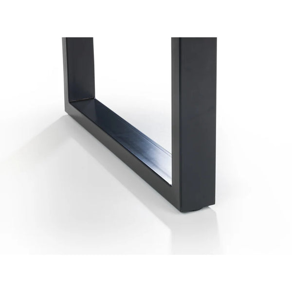 Black metal table leg on a white background