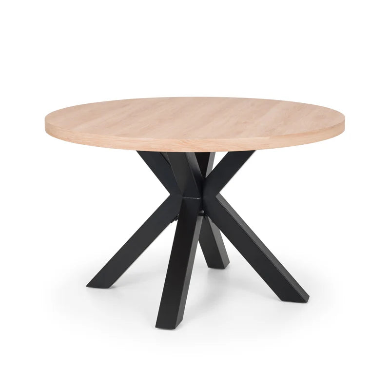 Round wooden table with black metal legs on a white background