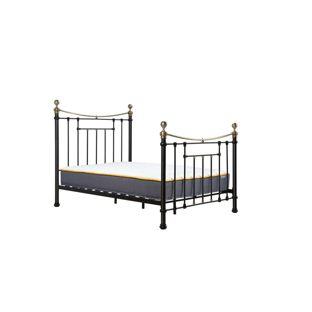 Metal bed frame with mattress on a white background