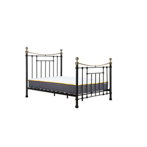 Metal bed frame with mattress on a white background