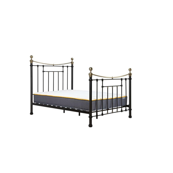 Metal bed frame with mattress on a white background