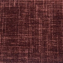 Close-up of a textured brown fabric with a subtle pattern