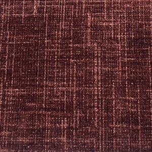 Close-up of a textured brown fabric with a subtle pattern