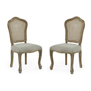 Two wooden chairs with caned backrests and upholstered seats on a white background