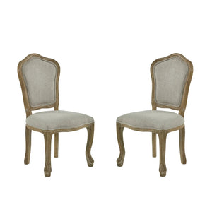 Pair of wooden chairs with upholstered seats and backrests on a white background