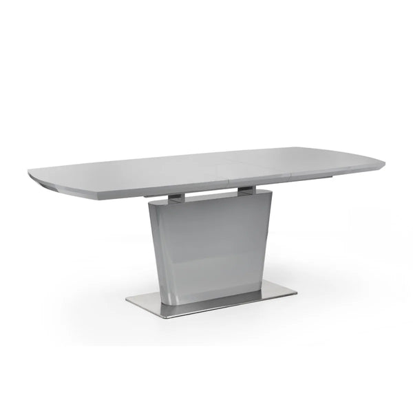 Modern dining table with a sleek design on a white background