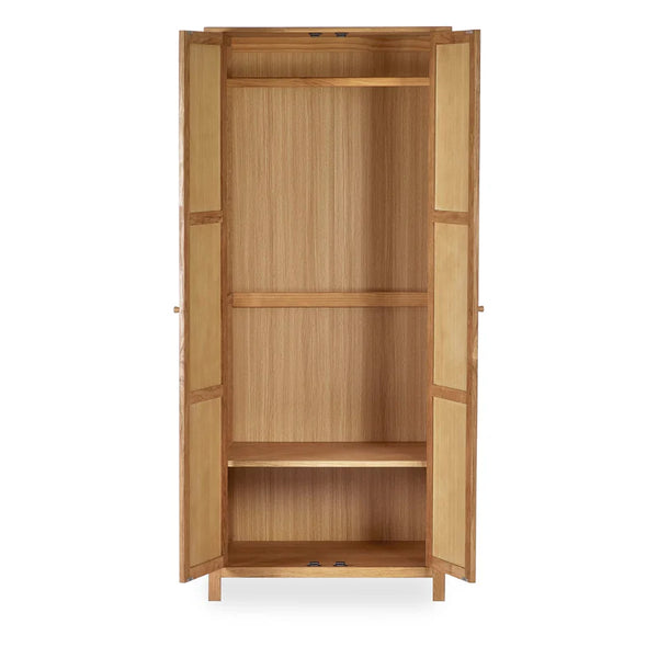 Wooden wardrobe with open doors on a white background