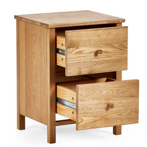 Wooden nightstand with two drawers on a white background