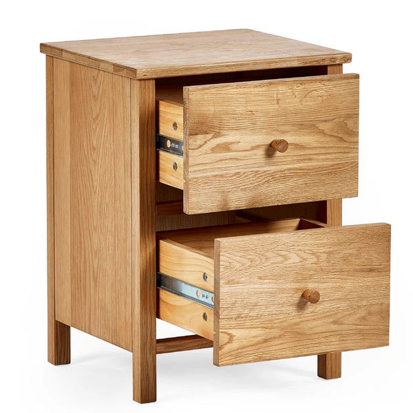 Wooden nightstand with two drawers on a white background
