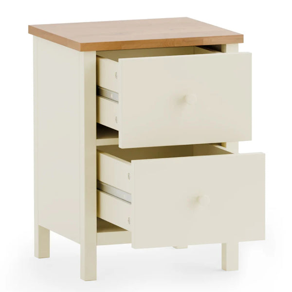 White nightstand with two drawers and a wooden top on a white background