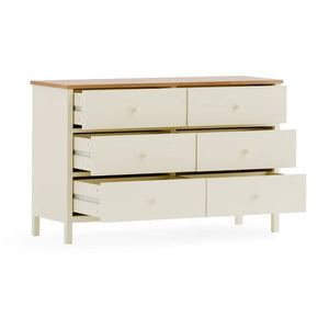 White dresser with wooden top on a white background