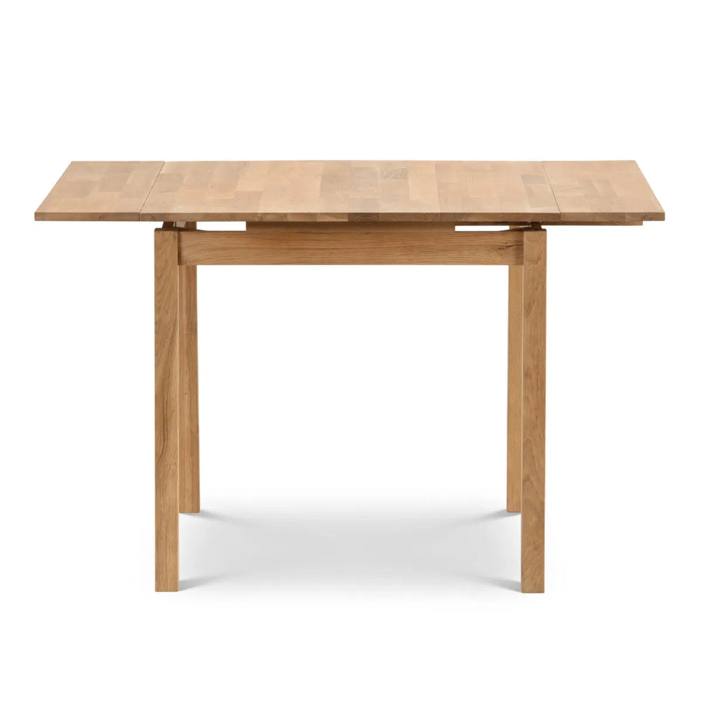 Wooden dining table on a white background