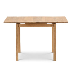Wooden dining table on a white background