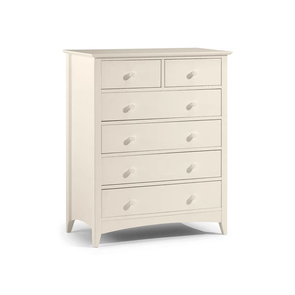 White dresser with multiple drawers on a white background
