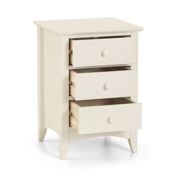 White wooden nightstand with three drawers on a white background