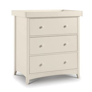 White changing unit dresser with three drawers on a white background