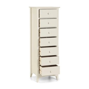 White tall chest of drawers with multiple drawers on a white background