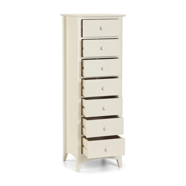 White tall chest of drawers with multiple drawers on a white background