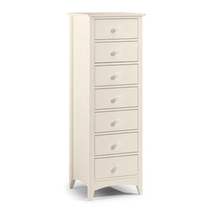 White tall chest of drawers with multiple drawers on a white background