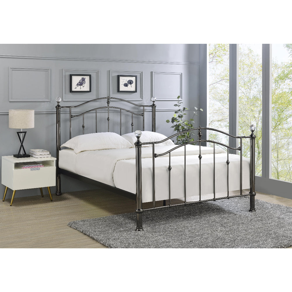 Black metal bed frame with decorative elements on a white background