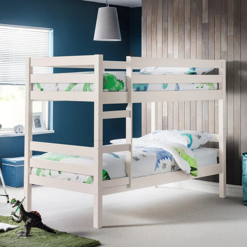 White bunk bed with dinosaur-themed bedding on a white background