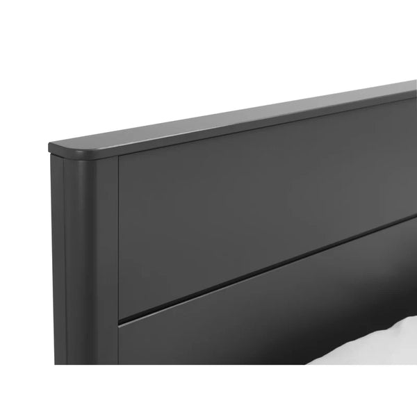 Black metal bed frame on a white background