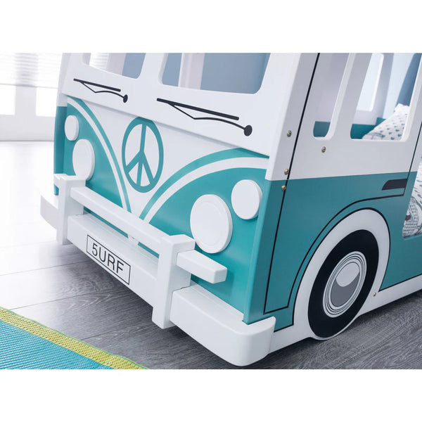 Children's bed designed like a vintage van with a peace symbol, on a wooden floor.