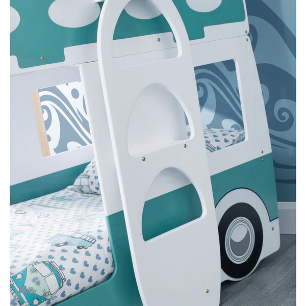 Children's bus-shaped bed with teal and white design in a bedroom setting.