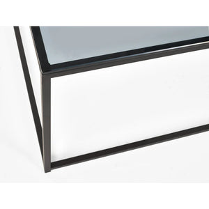 Close-up of a black metal frame with glass on a white background