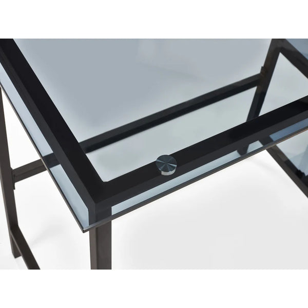 Glass table with black metal frame on a white background