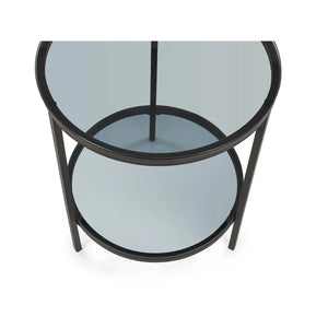 Round glass table with black metal frame on a white background