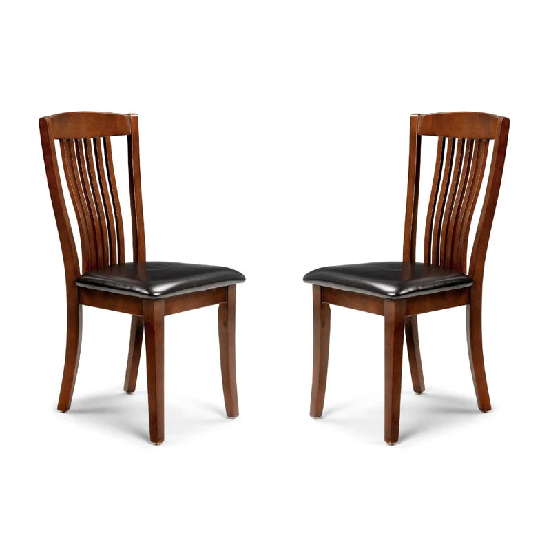 Two wooden chairs with black leather seats on a white background