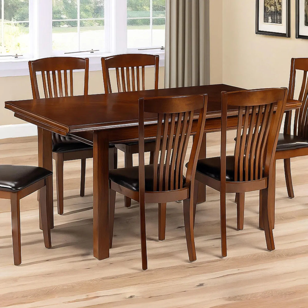 Wooden dining table on a white background