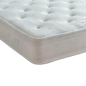 White mattress with a textured surface on a white background