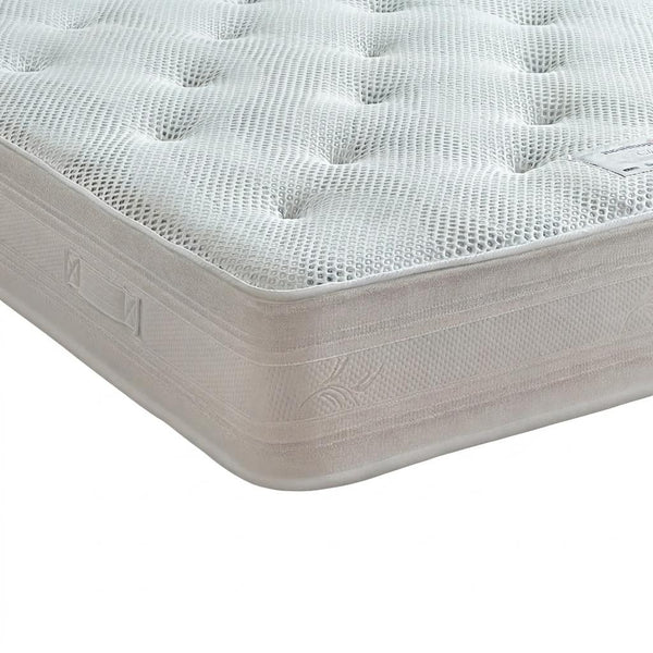 White mattress with a textured surface on a white background