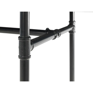 Close-up of a black metal pipe structure on a white background
