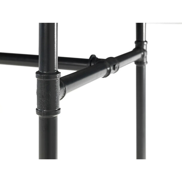 Close-up of a black metal pipe structure on a white background