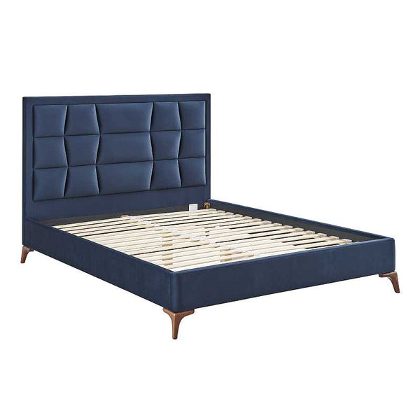 Blue upholstered bed with wooden legs on a white background