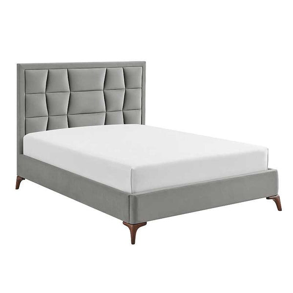 Gray upholstered bed with tufted headboard on a white background