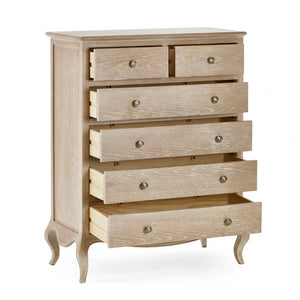 Wooden dresser with multiple drawers on a white background