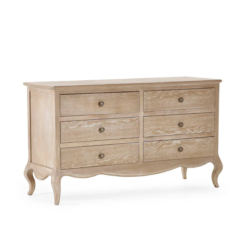 Wooden dresser with six drawers on a white background