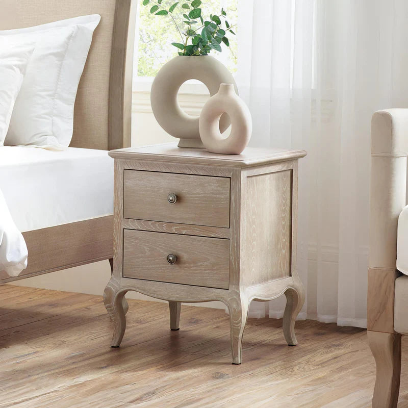 Wooden nightstand with two drawers on a white background