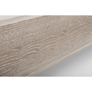 Close-up of a limed oak wooden surface with a light brown finish