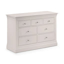 Grey dresser with multiple drawers on a white background