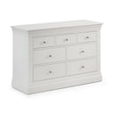 White dresser with multiple drawers on a white background